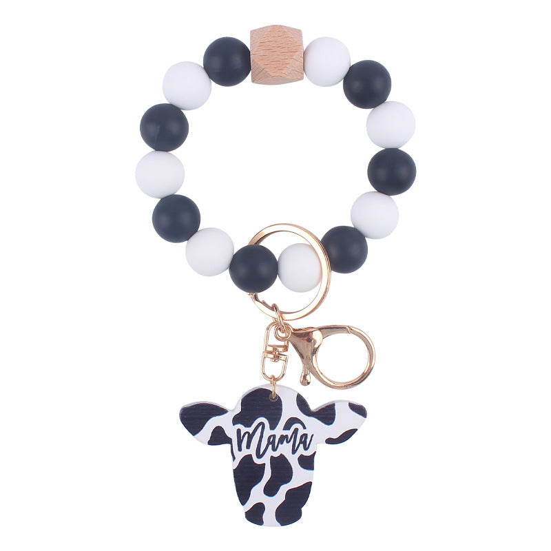 Wholesale Silicone Beads Cartoon Western Style Bull Head Wooden Sign Pendant Bracelet Keychains